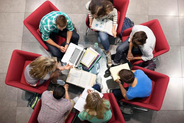 University students studying in a circle