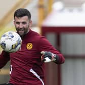 Rangers have signed Scotland goalkeeper Liam Kelly following the expiry of his Motherwell contract.