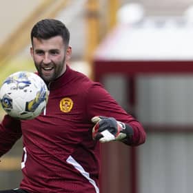 Rangers have signed Scotland goalkeeper Liam Kelly following the expiry of his Motherwell contract.