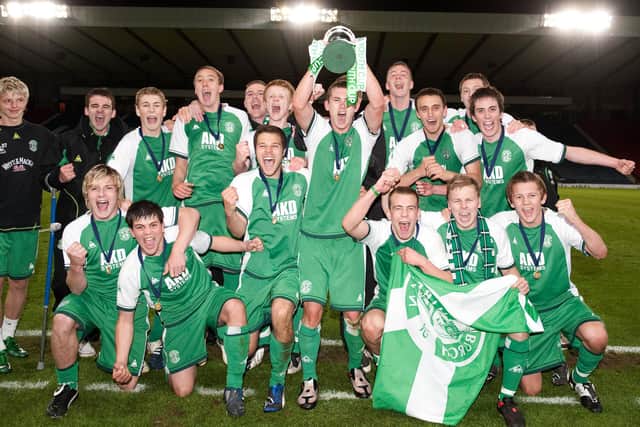 Hibs - with Callum Booth far right, second row - celebrate their Youth Cup final win over Rangers at Hampden in 2009