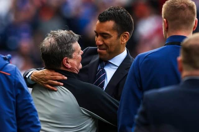 Rangers manager Giovanni van Bronckhorst celebrating with kitman Jimmy Bell after the Scottish Cup semi-final win over Celtic at Hampden last month. (Photo by Craig Williamson / SNS Group)