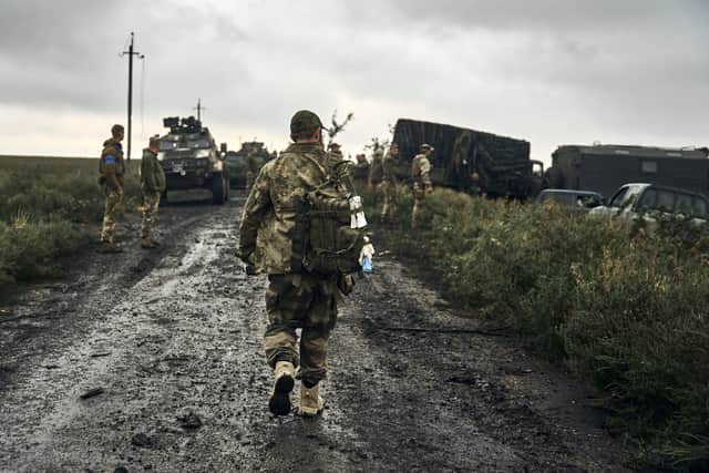 Ukrainian troops retook a wide swath of territory from Russia on Monday, pushing all the way back to the northeastern border in some places, and claimed to have captured many Russian soldiers as part of a lightning advance that forced Moscow to make a hasty retreat. (AP Photo/Kostiantyn Liberov)