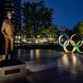 A bronze statue of Pierre de Coubertin (L), founder of the International Olympic Committee and the Olympic Rings are displayed at Japan Sport Olympic Square in Tokyo on April 20, 2020. - A Japanese expert who has criticised the country's response to the coronavirus warned on April 20 that he is "pessimistic" that the postponed Olympics can be held even in 2021. (Photo by Philip FONG / AFP) (Photo by PHILIP FONG/AFP via Getty Images)
