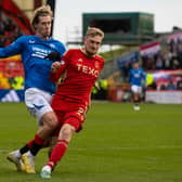 Aberdeen's Richard Jensen tackles Rangers' Todd Cantwell during the 1-1 draw at Pittodrie. (Photo by Craig Williamson / SNS Group)