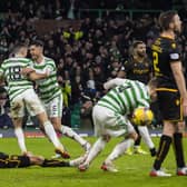 Celtic's Tom Rogic (left) celebrates with Nir Bitton after making it 1-0 against Motherwell.