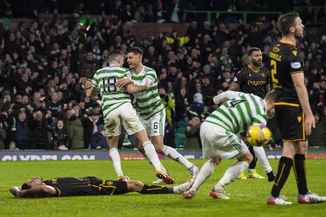 Celtic's Tom Rogic (left) celebrates with Nir Bitton after making it 1-0 against Motherwell.