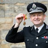 Chief Constable of Police Scotland, Iain Livingstone, poses with his medal after being appointed as a Knight Bachelor during an investiture ceremony at the Palace Of Holyroodhouse in Edinburgh earlier this year