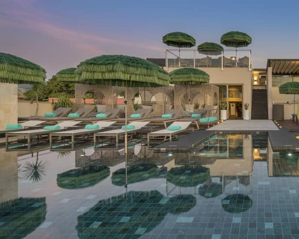The terrace and pool at the El Llorenç Parc de la Mar hotel