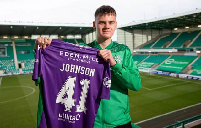 Hibernian goalkeeper Murray Johnson signs his first professional contract. (Photo by Craig Williamson / SNS Group)