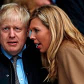 Could this be the moment when Carrie Symonds told Boris Johnson how much the new Downing Street wallpaper was going to cost? (Picture: Adrian Dennis/AFP via Getty Images)