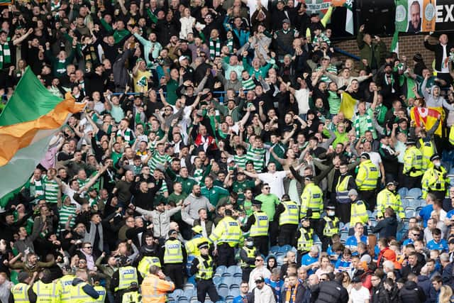 Celtic fans celebrate during a cinch Premiership match between Rangers and Celtic at Ibrox Stadium, on April 02, 2022, in Glasgow, Scotland.  (Photo by Craig Williamson / SNS Group)