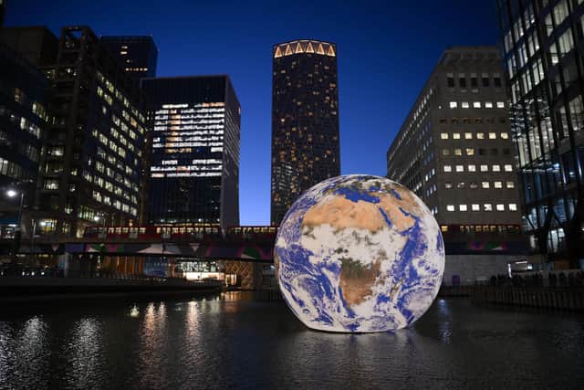Novuna's report comes after Luke Jerram's huge floating Earth installation, Gaia, was displayed in London earlier this year, shining a light on environmental issues. Picture: Daniel Leal/AFP via Getty Images.