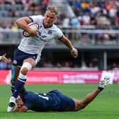 Duhan van der Merwe avoids the tackle attempts of USA's Nate Augspurger (11) and Tavite Lopeti (13) at Audi Field in Washington DC to score the try which equalled Stuart Hogg's all-time Scotland try record. (Photo by Scott Taetsch/Getty Images for Scottish Rugby)