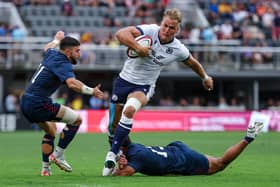 Duhan van der Merwe avoids the tackle attempts of USA's Nate Augspurger (11) and Tavite Lopeti (13) at Audi Field in Washington DC to score the try which equalled Stuart Hogg's all-time Scotland try record. (Photo by Scott Taetsch/Getty Images for Scottish Rugby)