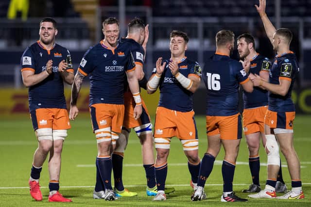 Edinburgh celebrate their Challenge Cup victory over Bath, their first win in a knockout tie for seven years. (Photo by Ross Parker / SNS Group)