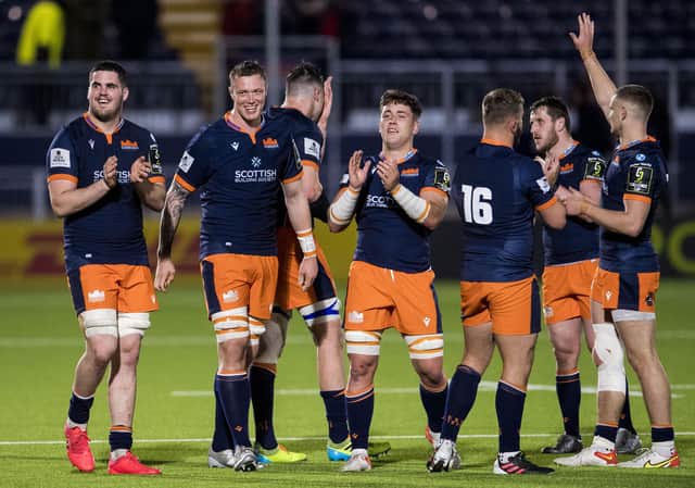 Edinburgh celebrate their Challenge Cup victory over Bath, their first win in a knockout tie for seven years. (Photo by Ross Parker / SNS Group)