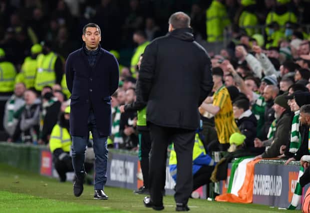 Rangers manager Giovanni van Bronckhorst interacts with Celtic manager Ange Postecoglou during Wednesday night's Old Firm clash. (Photo by Mark Runnacles/Getty Images)