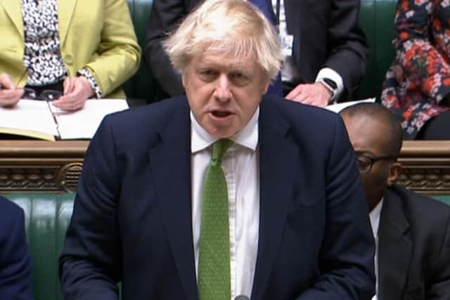 Prime Minister Boris Johnson announces limited sanctions against Russia at the Commons on Tuesday. Picture: AFP via Getty
