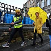 Nicola Sturgeon and candidate Roza Salih (L)  at Annette Street school polling station in Glasgow