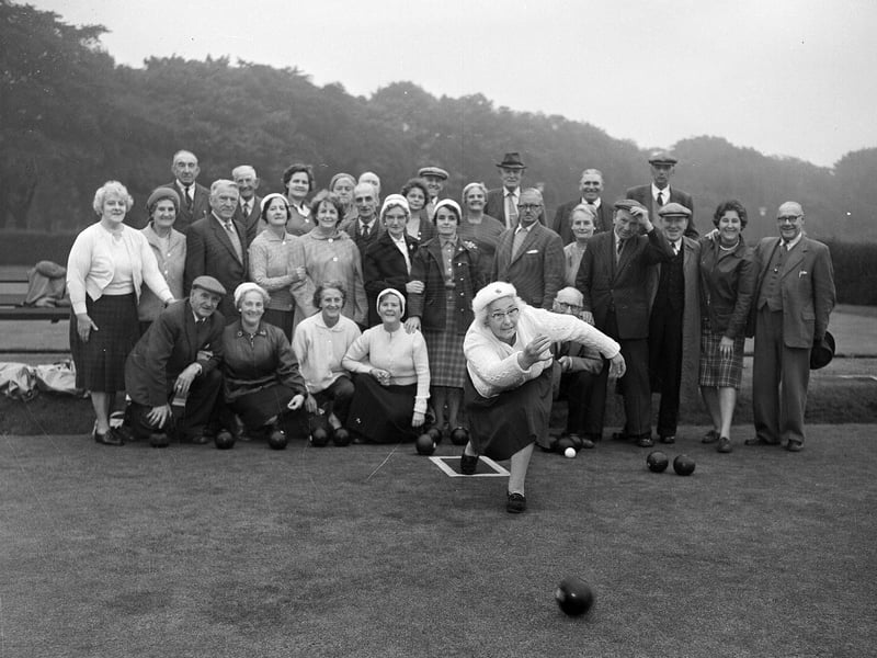 More sporting prowess on show here. Mrs J Watson is shown taking part in a match between the Ladies and the OAPs at the bowling greens at East Meadows.