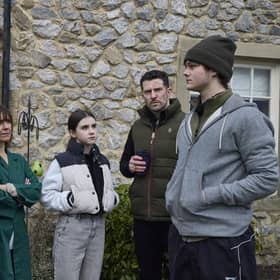 Fred Kettle on set at Emmerdale with his co-stars. Photo: ITV