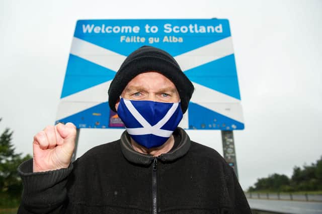 Sean Clerkin of Action For Scotland, at the Scottish/English border at Berwick.