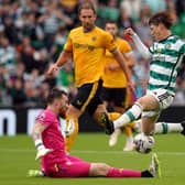 Wolverhampton Wanderers goalkeeper Jose Sa saves at the feet of Celtic’s Kyogo Furuhashi.