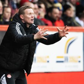 Barry Robson encourages his team during Aberdeen's 2-0 win over Rangers.