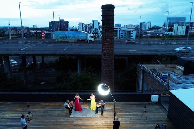 Musicians from the Ando Glaso Collective were filmed beside the M8 motorway in Glasgow for the arts project Sonic Surroundings. Picture: Louise Mather