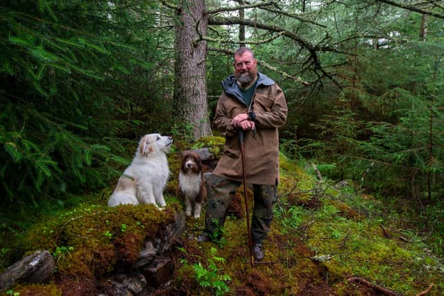 Duncan Bain MacKenzie, descendant of one of the clearance families stands amongst the Inverlael township ruins ©Jim Dunn.jpg