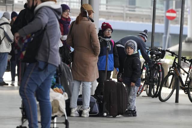 Ukrainian refugees wait for a transport at the central train station in Warsaw. Picture: AP Photo/Czarek Sokolowski