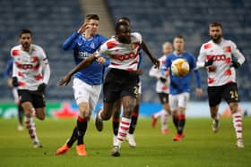 Merveille Bokadi of Standard Liege is challenged by Cedric Itten of Rangers during the UEFA Europa League Group D stage match . (Photo by Ian MacNicol/Getty Images)