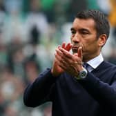 Rangers manager Giovanni van Bronckhorst applauds the away supporters at Celtic Park after his team's 1-1 draw on Sunday. (Photo by Ian MacNicol/Getty Images)