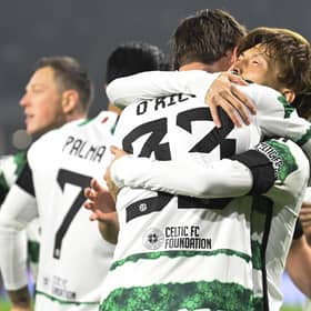 Matt O'Riley and Kyogo Furuhashi celebrate the Japanese's opening goal against Atletico Madrid.