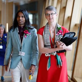 MSPs Lorna Slater and Maggie Chapman of the Scottish Greens flank Q Manivannan, one of the party's two newly elected trans members, whose election led to the 'sex' category being removed from the Scottish Parliament website (Picture: Jeff J Mitchell/Getty Images)