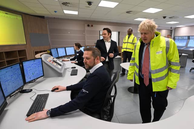 Prime Minister Boris Johnson meets staff in the control centre training area during a visit to Hinkley Point C nuclear power station. Mr Johnson is in favour of nuclear power.