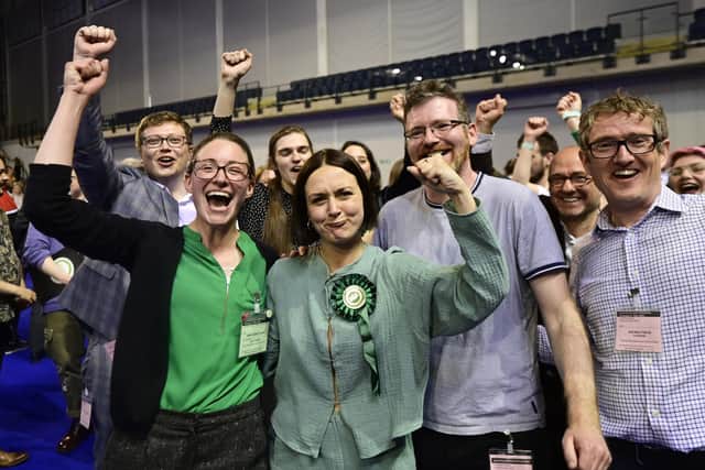 The Scottish Green Party's Holly Bruce celebrates victory at the Glasgow council election count with fellow Greens (Photo: John Devlin).