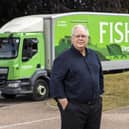 Fishers’ managing director, Michael Jones, with one of the firm's familiar trucks. Picture: Robert Perry