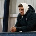 David Goodwillie watches Raith Rovers and Queen of the South play at Stark's Park