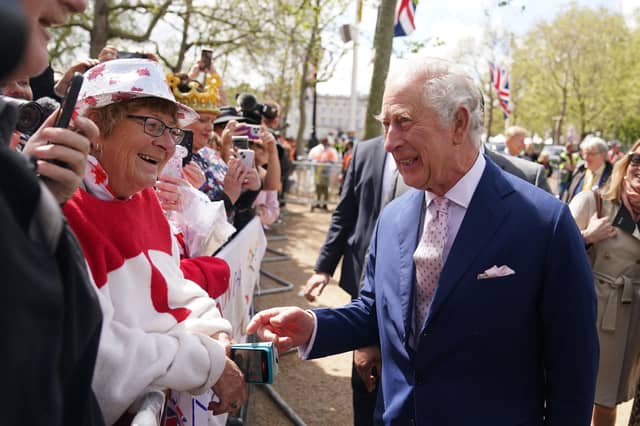 King Charles III on a walkabout outside Buckingham Palace