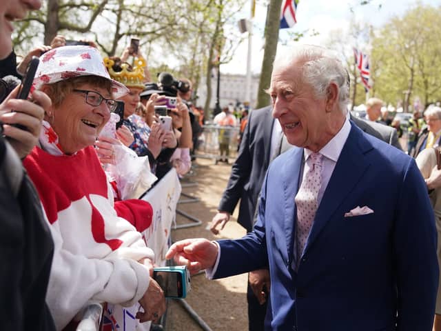 King Charles III on a walkabout outside Buckingham Palace