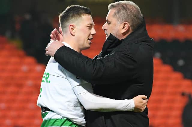 Celtic manager Ange Postecoglou and Callum McGregor embrace as the title is delivered at Tannadice on Wednesday. The two men were monumental in their roles as manager and captain to bringing about the success. (Photo by Ross Parker / SNS Group)