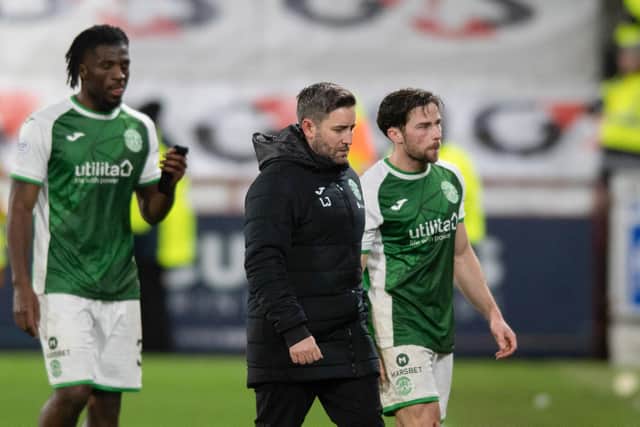 Hibs Lee Johnson looks dejected after the 3-0 defeat to Hearts at Tynecastle. (Photo by Mark Scates / SNS Group)