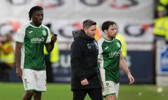 Hibs Lee Johnson looks dejected after the 3-0 defeat to Hearts at Tynecastle. (Photo by Mark Scates / SNS Group)
