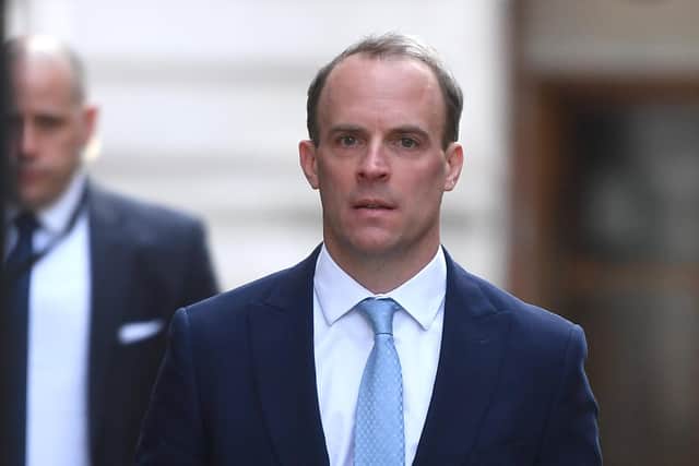 Foreign Secretary Dominic Raab arrives at 10 Downing Street for an update briefing on coronavirus