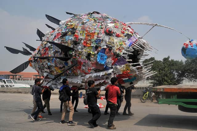 An installation depicting an anglerfish, made from plastic waste, is displayed by environmental activists during a rally in Jakarta on 20 July, 2019 PIC: Dasril Roszandi / AFP via Getty Images