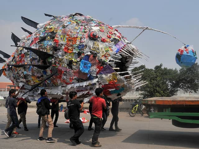 An installation depicting an anglerfish, made from plastic waste, is displayed by environmental activists during a rally in Jakarta on 20 July, 2019 PIC: Dasril Roszandi / AFP via Getty Images