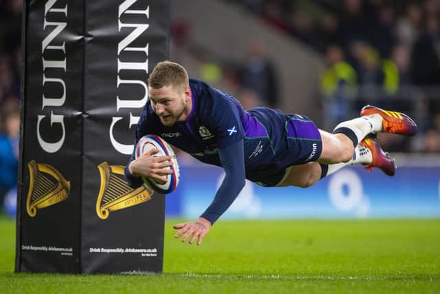Finn Russell goes over for Scotland's fifth try against England during the 38-38 thriller at Twickenham in 2019. Picture: Bill Murray/SNS