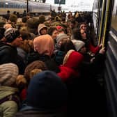 Refugees struggle to board a train at Lviv's main station, Ukraine. Picture: Gustavo Basso/NurPhoto via Getty Images