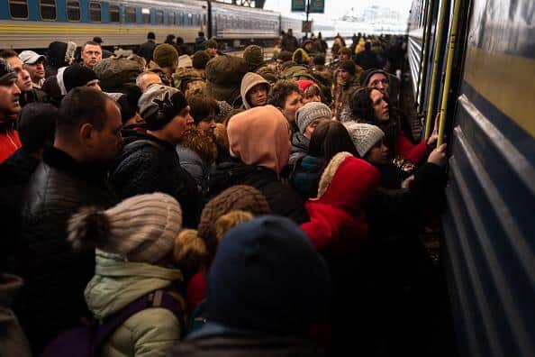 Refugees struggle to board a train at Lviv's main station, Ukraine. Picture: Gustavo Basso/NurPhoto via Getty Images